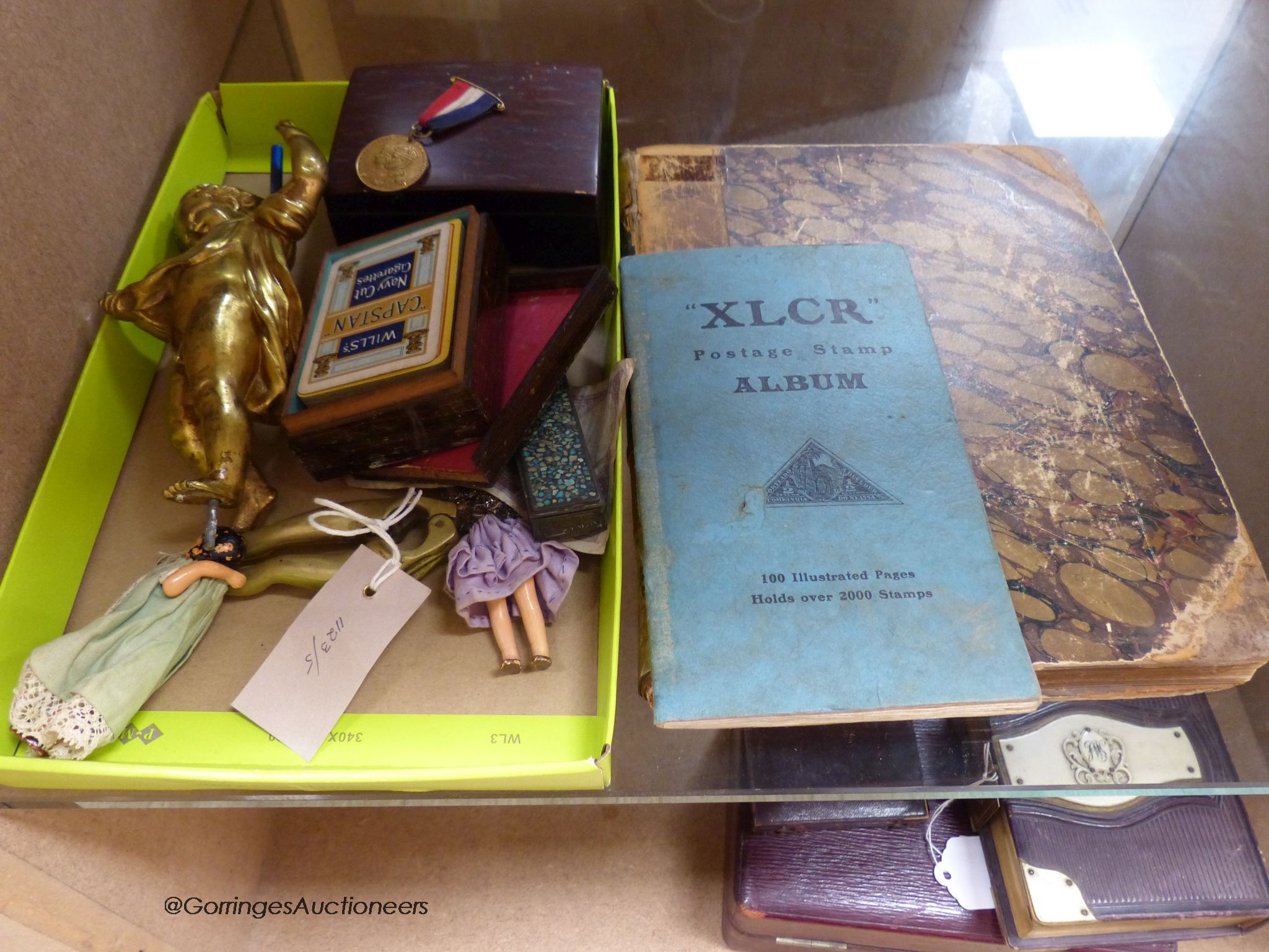 A 19th century gilt bronze figure surmount, brass 'Legs' nutcrackers and other items